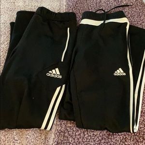 Two pairs of adidas pants